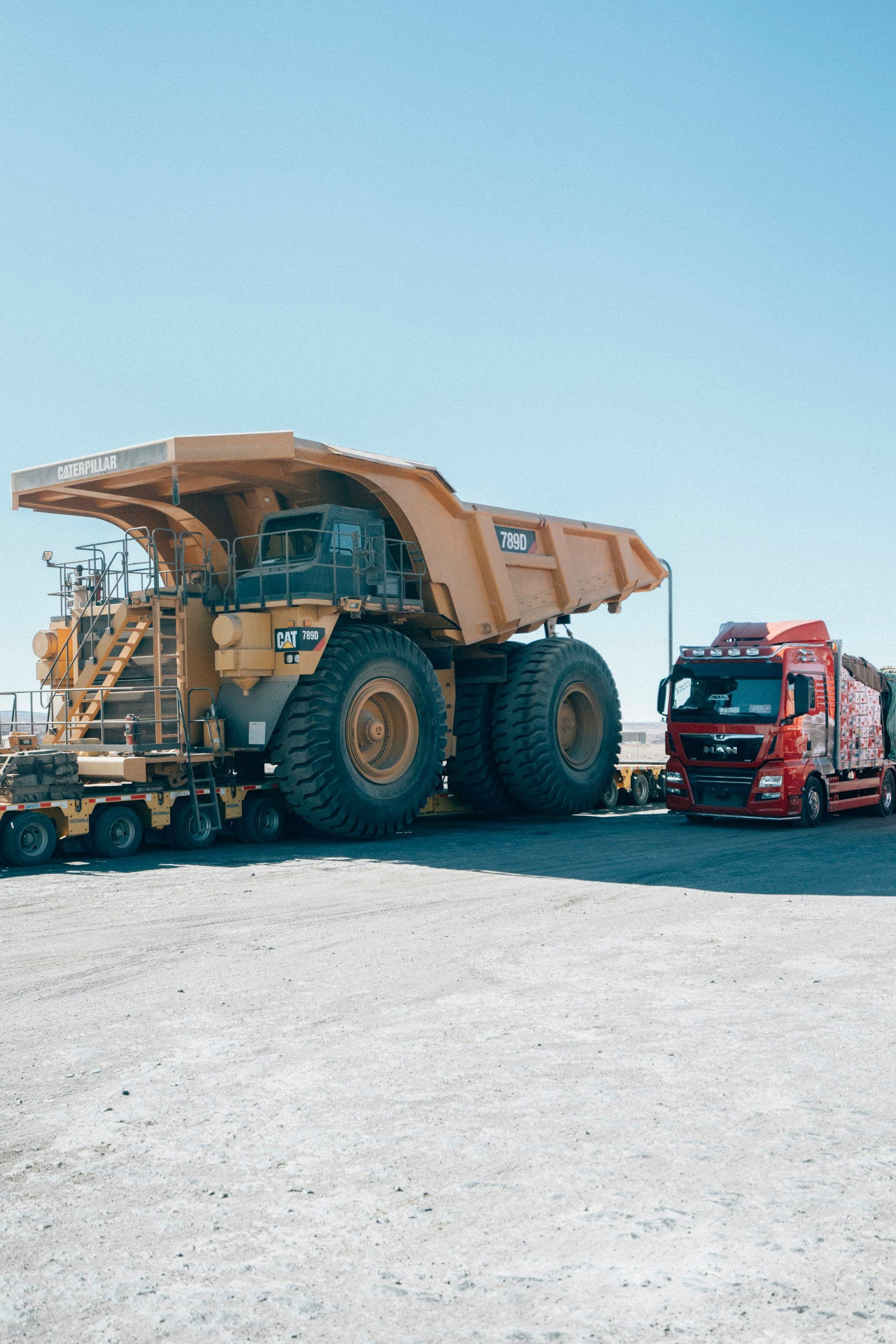 Concrete pump truck extended for a high-rise pour
