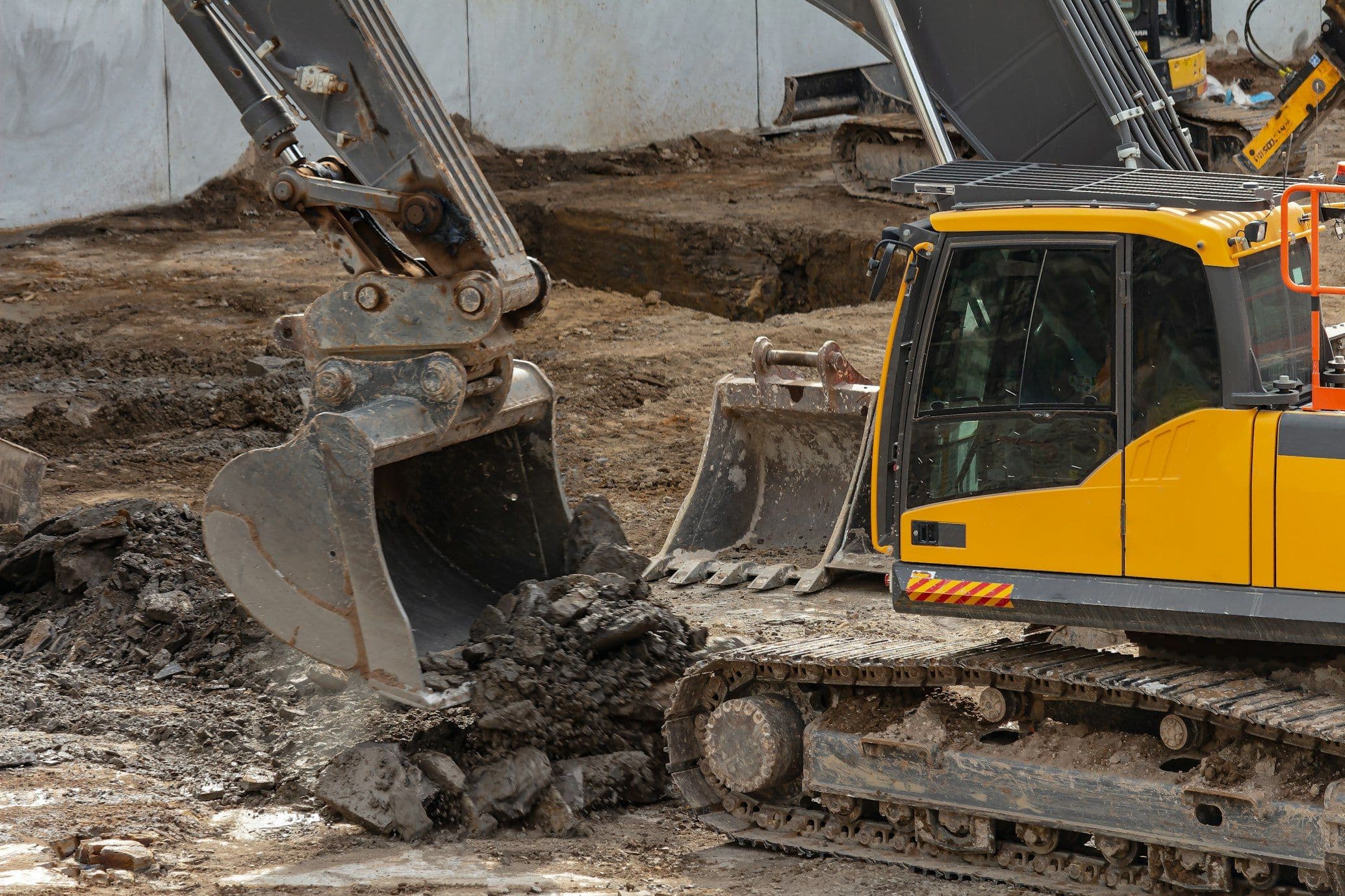 Hydraulic excavator on an earthworks site